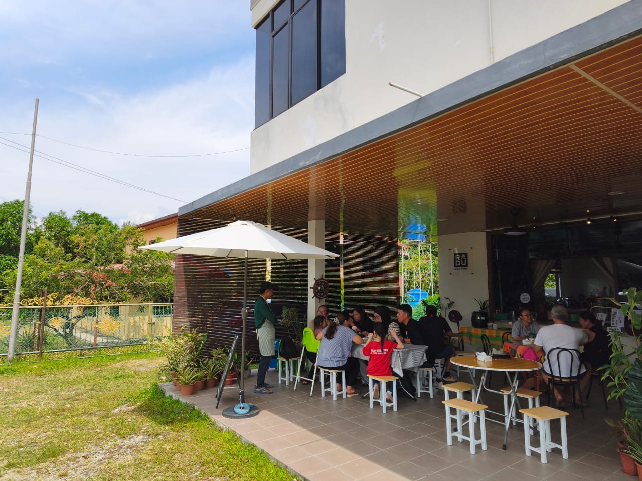 The riverside garage cafe on a weekend
